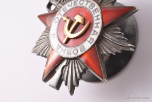 Нагрудный знак Отечественной Войны 2 степени 