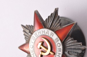 Нагрудный знак Отечественной Войны 2 степени 
